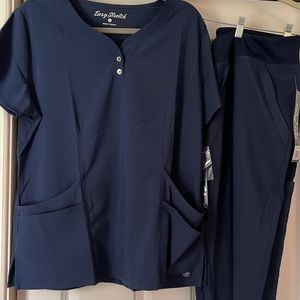 Easy stretch navy scrubs, size large. NWT